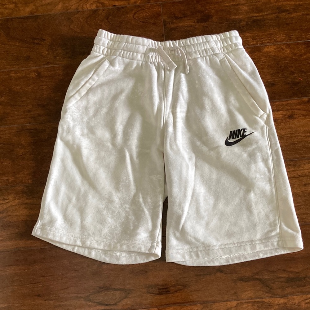 White Nike shorts